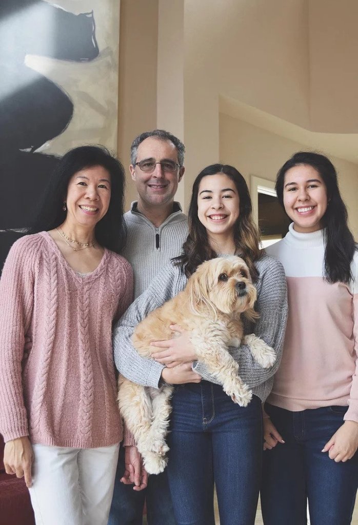An Jimenez with her family and her dog
